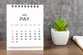 The July 2023 Monthly desk calendar for 2023 with diary on wooden table Royalty Free Stock Photo