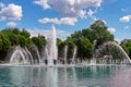 06 July 2019 Moscow, Russia. Tourists and locals rest in Gorky park. Summer sunny day at a beautiful splashing fountain with