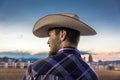 JULY 22, 2017 NORWOOD COLORADO - cowboy in plad shirt watches San Miguel Basin Rodeo, San Miguel. USA, Man Royalty Free Stock Photo