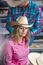 JULY 18, 2017 NORWOOD COLORADO - cowgirl in pink watches San Miguel Basin Rodeo, San Miguel County. USA, competition Royalty Free Stock Photo