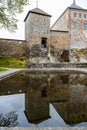 July 27, 2013 Oslo, Norway Akershus fortress. A stone tower with a reflection above the lake Royalty Free Stock Photo