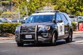 July 26, 2019 Palo Alto / CA / USA - Police car driving on the street, close to downtown Palo Alto, San Francisco bay area Royalty Free Stock Photo