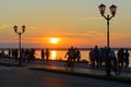 People and couples walking along the embankment Royalty Free Stock Photo