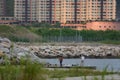 the people fishing on the Sewage outlet 26 July 2004