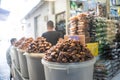 July 8. People in the market selling dates and assorted chickpeas near Sunan Ample Mosque in Surabaya, Indonesia.