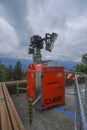 July 2021 Reggio Emila, Italy: Orange generator Generac cube close-up in the mountains Royalty Free Stock Photo