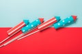 July 4, rockets for fireworks on a blue red background with space for text. in the style of minimalism Royalty Free Stock Photo