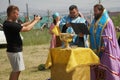 July 11, 2020, Russia, Magnitogorsk. Photographer-reporter takes pictures of Orthodox priests performing outdoor services