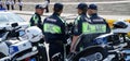 July 18 2019 Russia Magnitogorsk. Police officers discuss professional issues while standing next to patrol motorcycles.