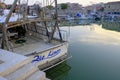 July 2022 Senigallia, Italy: Boats in the port during sunrise. Senigallia marina across buildings. Canal in Senigallia