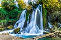July 12, 2016: At tall waterfall at the Kravica Waterfalls, Bosnia and Herzegovina