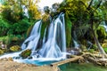 July 12, 2016: At tall waterfall at the Kravica Waterfalls, Bosnia and Herzegovina