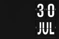 July 30th. Day 30 of month, Calendar date. Calendar in the form of a mechanical scoreboard tableau. Summer month, day of the year