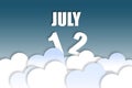 july 12th. Day 12 of month,Month name and date floating in the air on beautiful blue sky background with fluffy clouds. summer