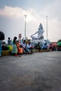 July 4th 2022 Haridwar India. Lord Shiva statue at the Haridwar railway Station with people sitting all around in waiting