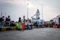 July 4th 2022 Haridwar India. Lord Shiva statue at the Haridwar railway Station with people sitting all around in waiting