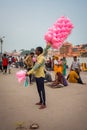July 8th 2022 Haridwar India. A Man selling colorful cotton candy at the banks or ghats of river Ganges Royalty Free Stock Photo