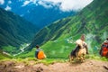 July 14th 2022, Himachal Pradesh India. People with a walking stick trekking down to Parvati bagh valley during Shrikhand Mahadev