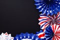 July 4th patriotic party concept. Happy Independence Day banner design. Flat lay, top view American paper fans on black background Royalty Free Stock Photo