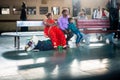 July 4th 2022 Punjab India. A small town family, husband wife and their kid waiting on a Railway platform with luggage. India