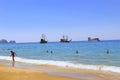 July, 2017 - Vacationers bathe in the sea and sunbathe in the sun on Cleopatra Beach Alanya, Turkey