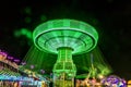July 18, 2017 VENTURA CALIFORNIA - Illuminated fair ride with blurred neon lights at the Ventura. Light, bright