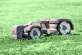 Robot automatic lawn mower working on a grass
