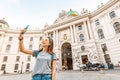 Asian tourist taking selfie photo on her smartphone in Vienna, Austria Royalty Free Stock Photo