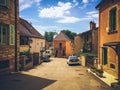 July 19, 2017. Village Cormatin France burgundy region in summer. Old stone facade of the apartment buildings. The