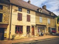 July 19, 2017. Village Cormatin France burgundy region in summer. Old stone facade of the apartment buildings. The