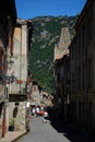 A pretty street busy with tourists in the pretty walled town of Villfranche de Conflent in the south of France. This medieval city
