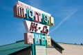 The colorful, vintage Hi-Lo Motel and Cafe sign indicates that the motel has vacancy for summer