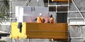 July 15, 2021. Workers loading building supplies into the new home unit block at 56-58 Beane St. Commercial use image