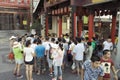 On July 31, 2014 in xi 'an wild goose pagoda scenic area in the square, a folk artists intently rub blowing the calf, lamb, small