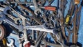 Jumble of old rusty hand tools. Old rusty messy hand tools