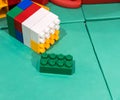Jumbo building blocks on leather mat for fun playtime. Royalty Free Stock Photo