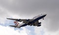 Jumbo 747 passenger jet with landing gear down Royalty Free Stock Photo