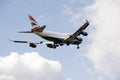 Jumbo 747 passenger jet with landing gear down Royalty Free Stock Photo