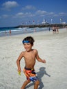 Happy boy on Jumeirah Beach in Dubai