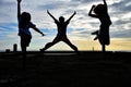 They jump on the bridge gestures evening sun sets three and four. Royalty Free Stock Photo