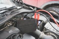 Jump cables on car low power battery