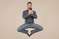 jump ceo meditating online. sms and instant messaging. yoga energetic businessman chat online.