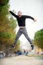 Jump... Excited Happy Man Jumping Up high, Wearing Casual Clothe Royalty Free Stock Photo