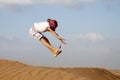 Jump and fun in the desert dunes