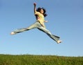 Jump girl with hair on sky Royalty Free Stock Photo