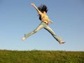 Jump girl with hair on sky Royalty Free Stock Photo