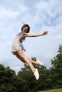 Jump for happy success by beautiful woman