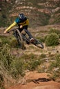 Jump, mountain bike and cyclist performing extreme sport stunt on his bike. Adrenaline, fitness and biking man riding