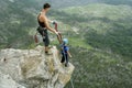 Jump off a cliff with a rope. Bungee jumping Royalty Free Stock Photo