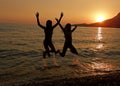 Jump in sea sunset Royalty Free Stock Photo